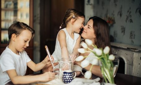 Mom baking with two kids at home