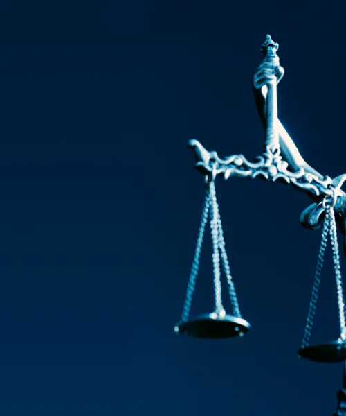 Justice statue of a woman holding scales